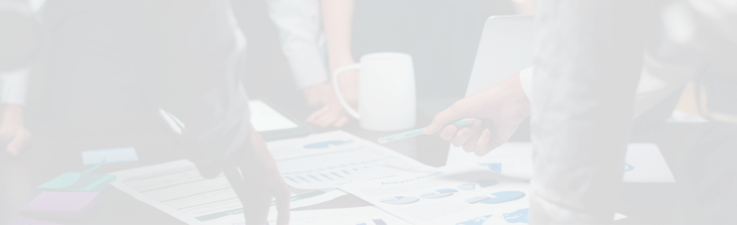 Team analyzing business performance charts in a meeting